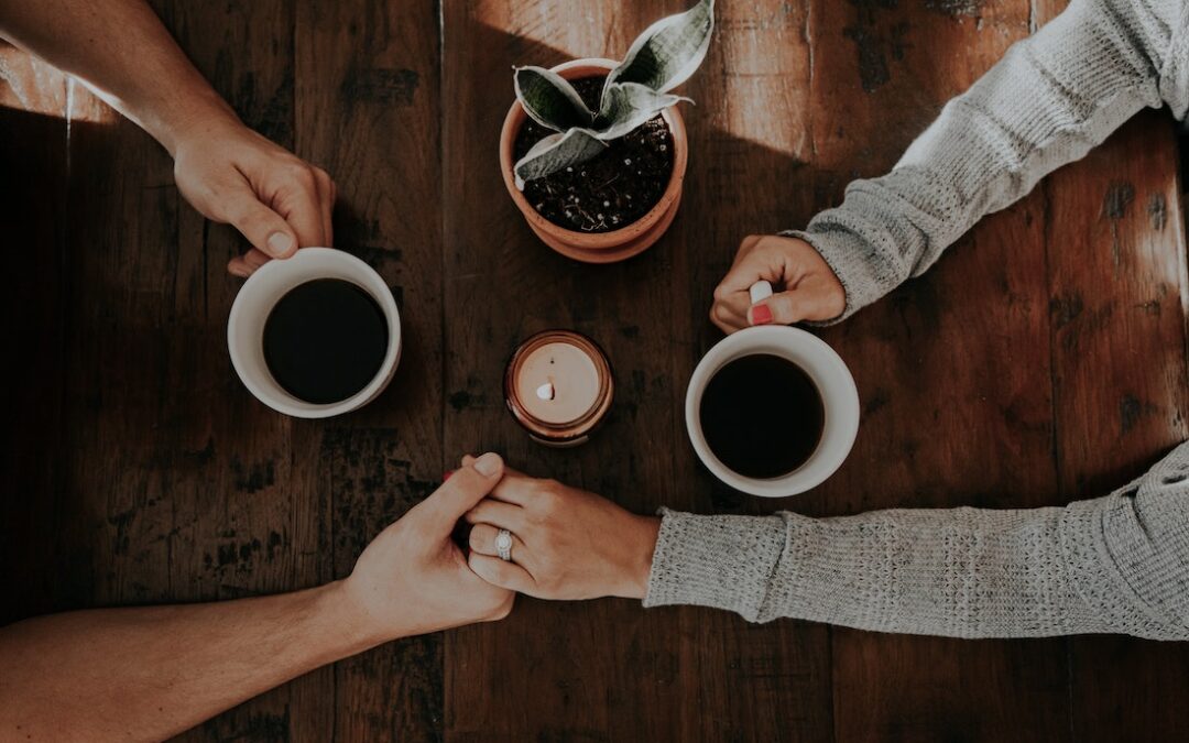 Two people holding hands